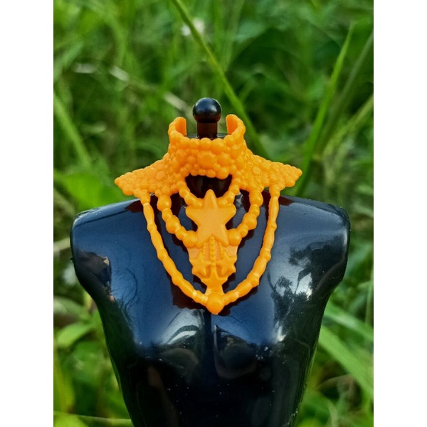 kalung boneka varian oranye