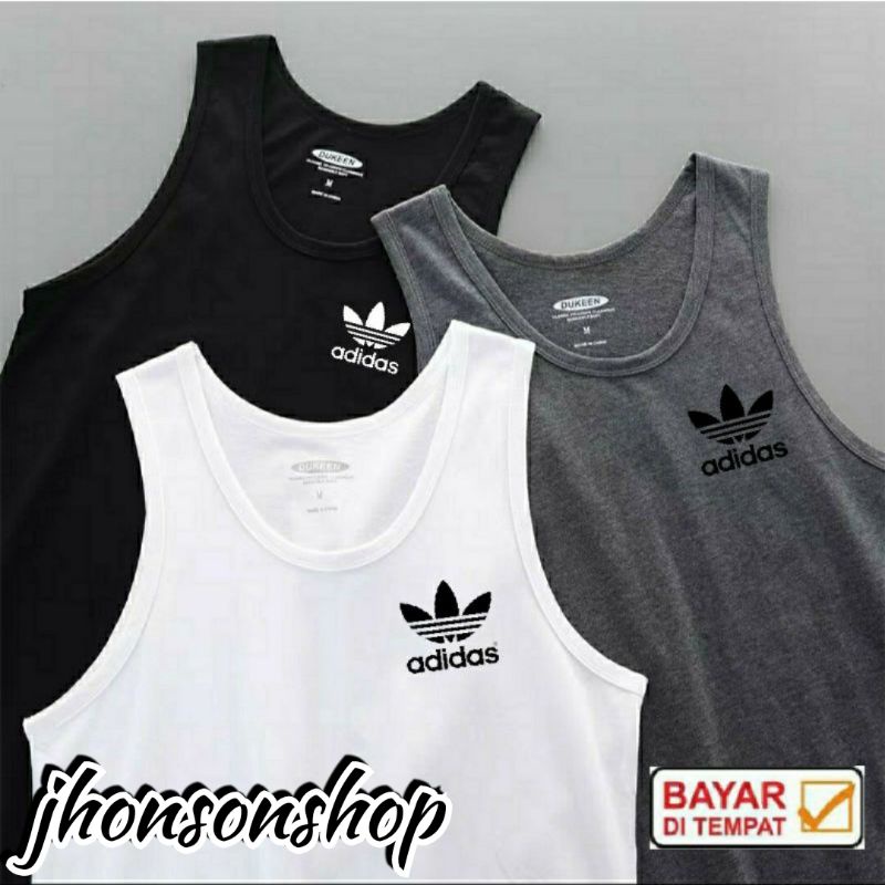 kaos singlet {.ADD4$.} CATTON COMBET.buat pria dewasa bahan enak dipakai