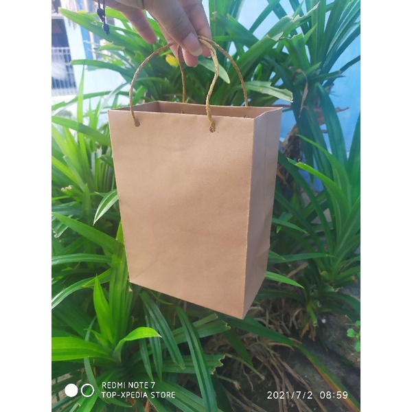 

Ready Paperbag kraft coklat 135gsm P15xL9xT21 polos