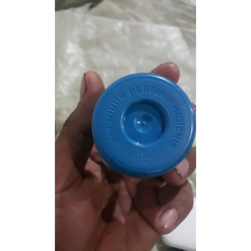 tutup galon air minum isi ulang
