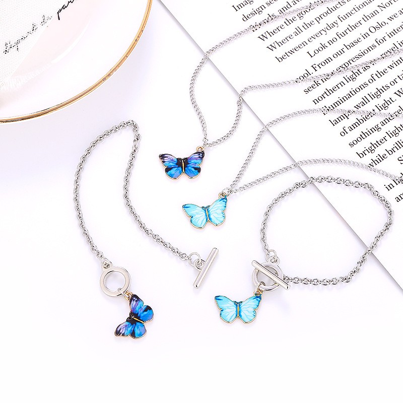 Kalung Rantai Dengan Liontin Kupu-Kupu Warna Biru Gradasi Untuk Wanita Gelang