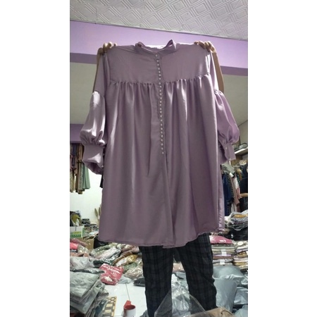 tunik seribu kancing