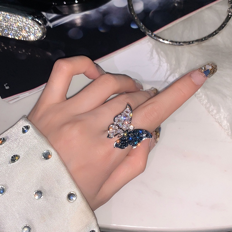 Cincin Model Terbuka Desain Kupu-Kupu Hias Berlian Imitasi Warna Biru Tua Untuk Wanita