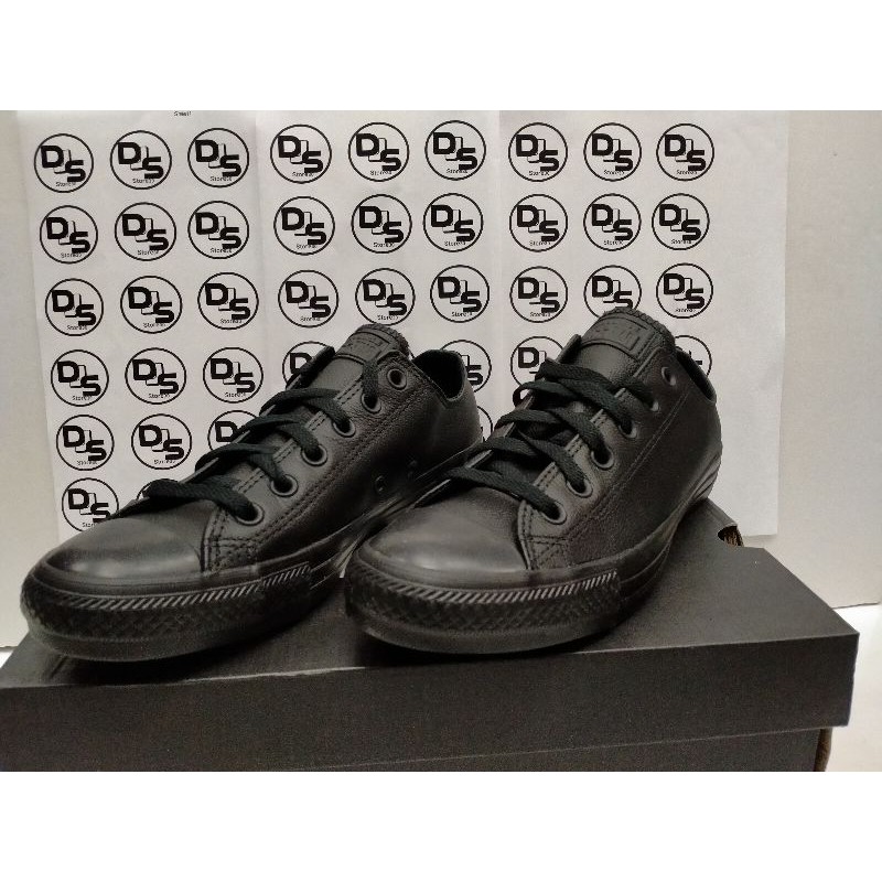 chucks black leather
