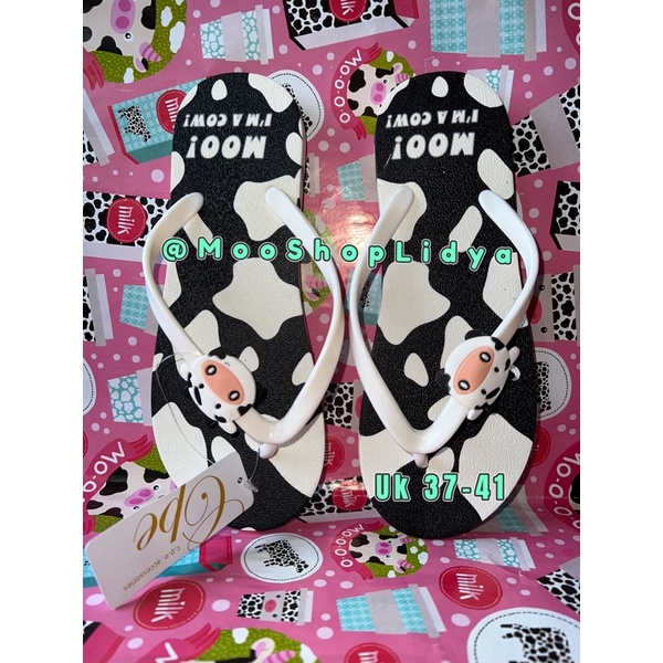 sandal hitam putih motif sapi