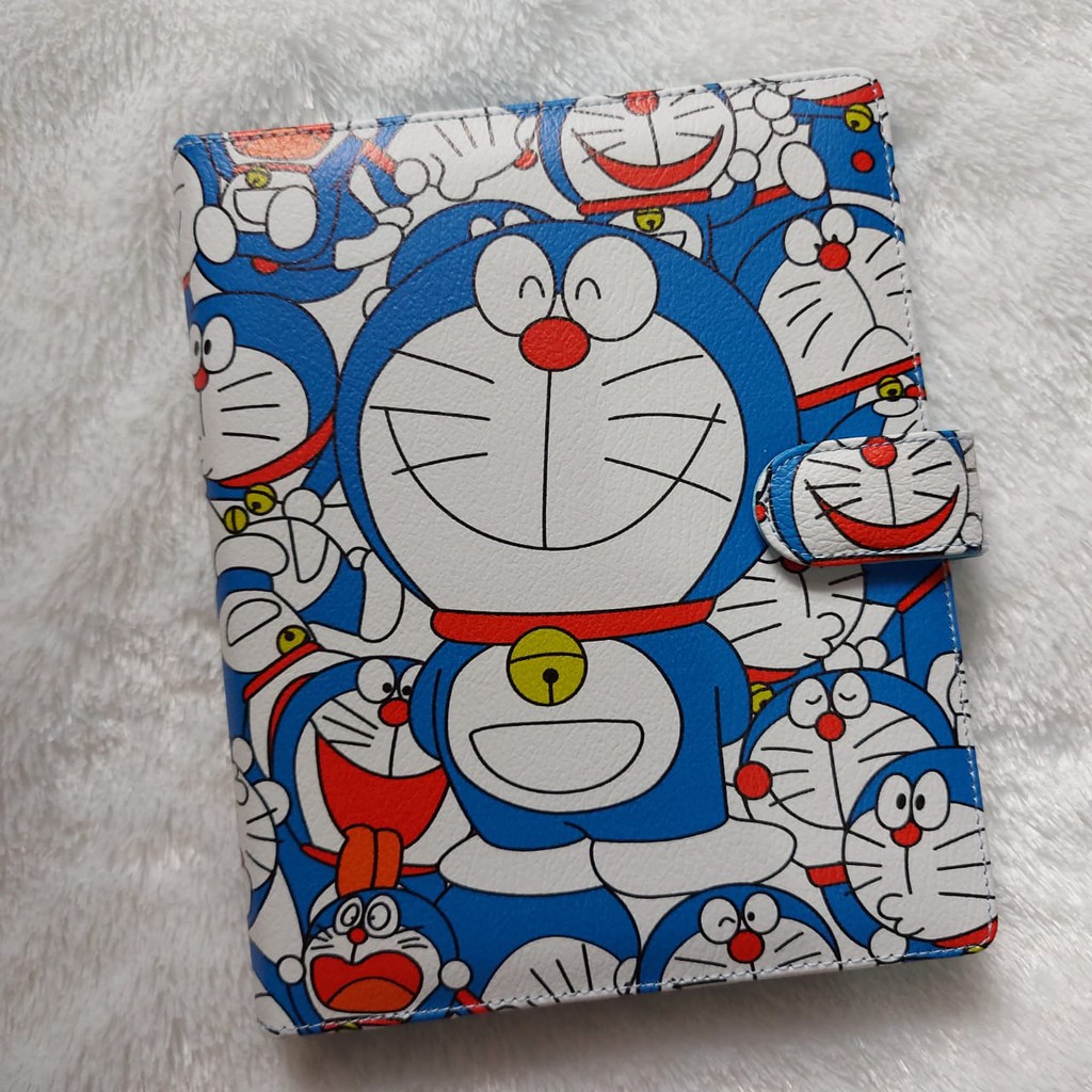 

BINDER PRINTING MOTIP DORAEMON A5/20RING DAN B5/26RING
