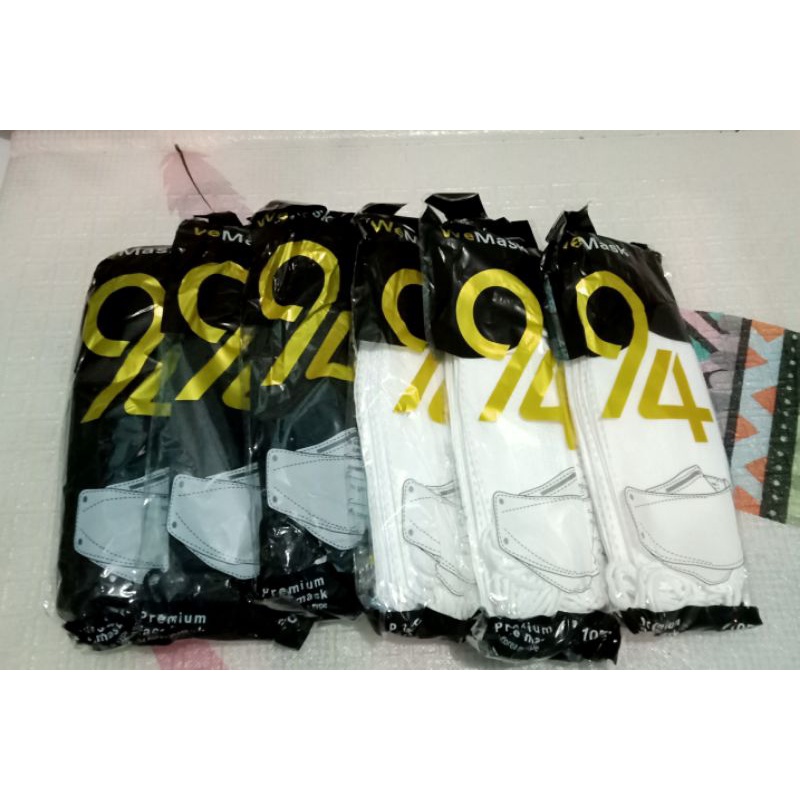 MASKER KF94 WEMASK ISI 10 WARNA HITAM DAN PUTIH