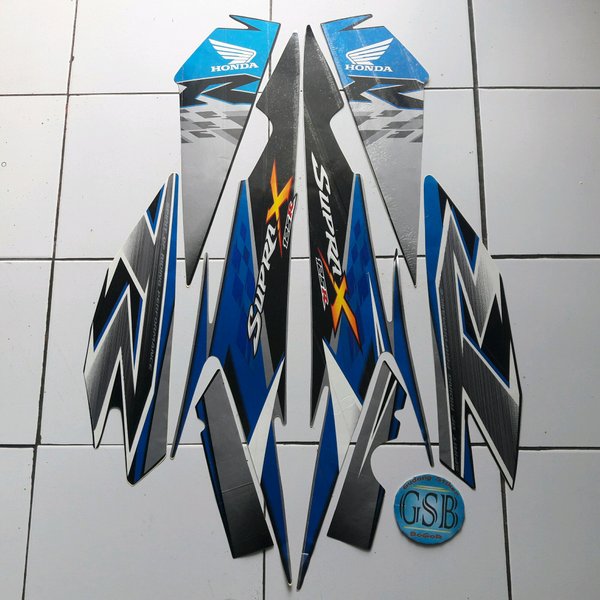 striping supra x 125 2010 biru