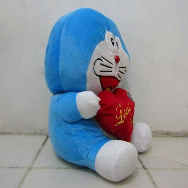 Boneka doraemon SNI love size:XL