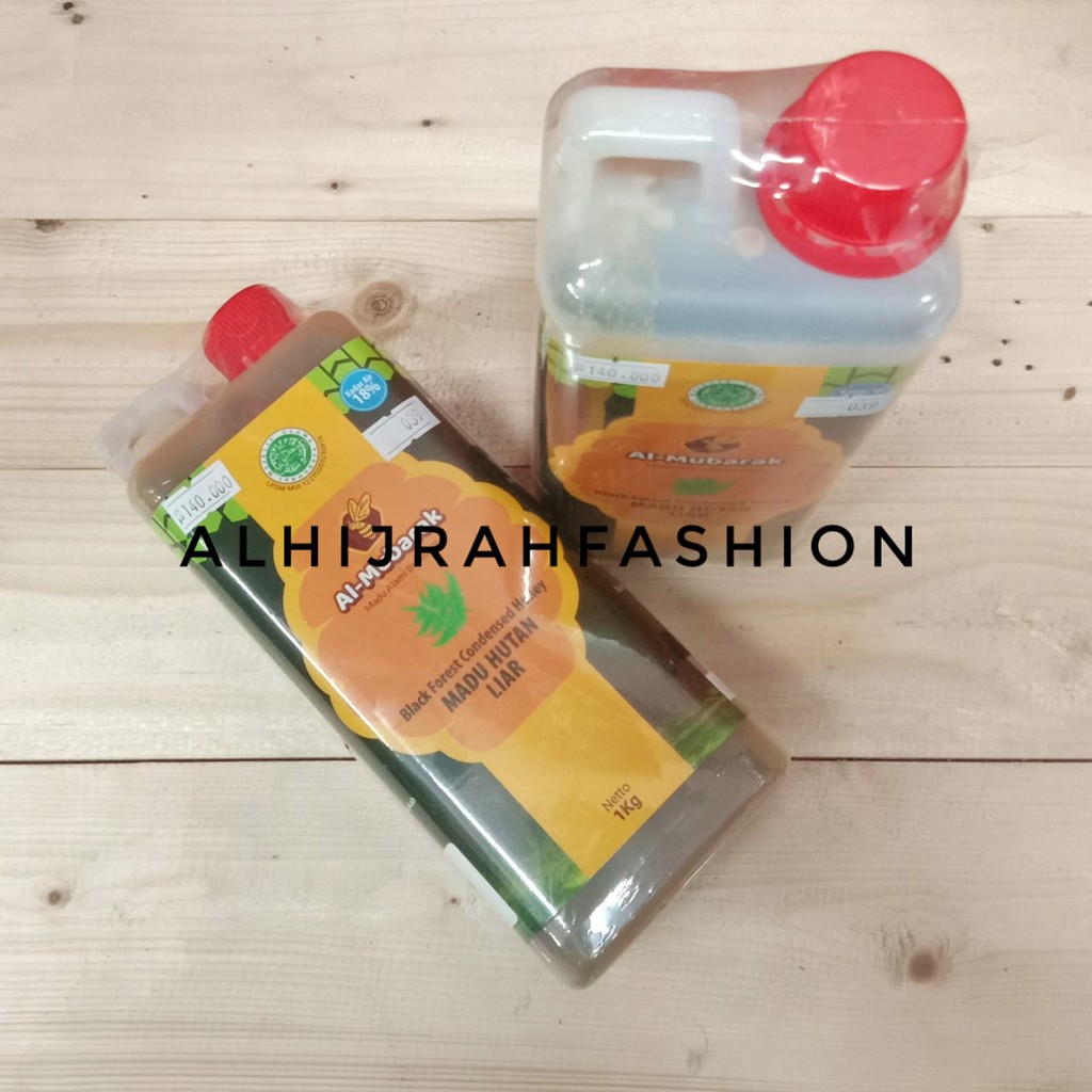 

Madu Hutan Liar Kental isi 1kg Al Mubarak Kadar Air 18% Madu Murni Madu Asli