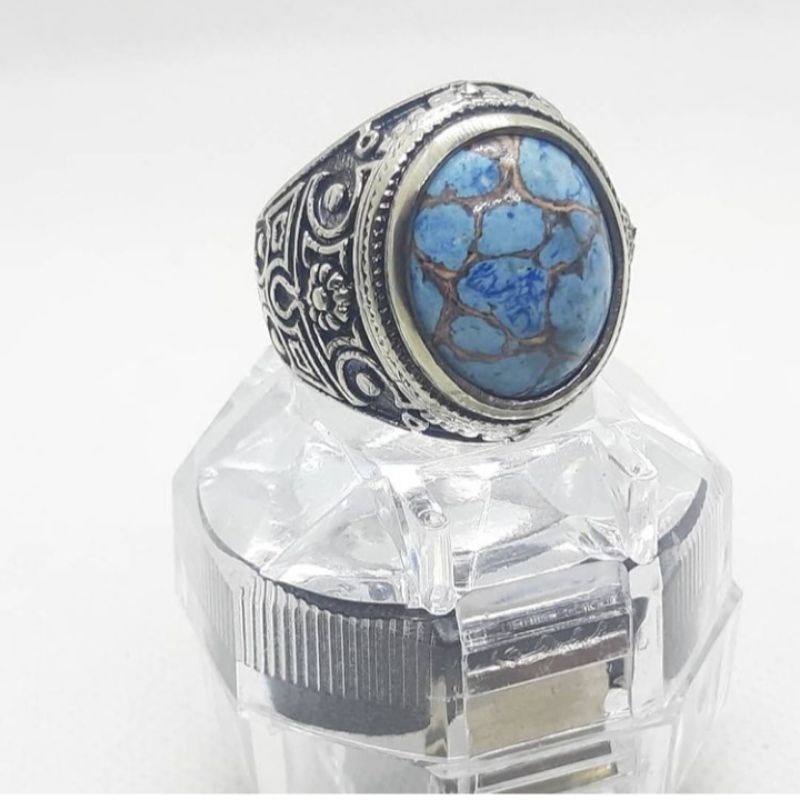 cincin batu permata virus