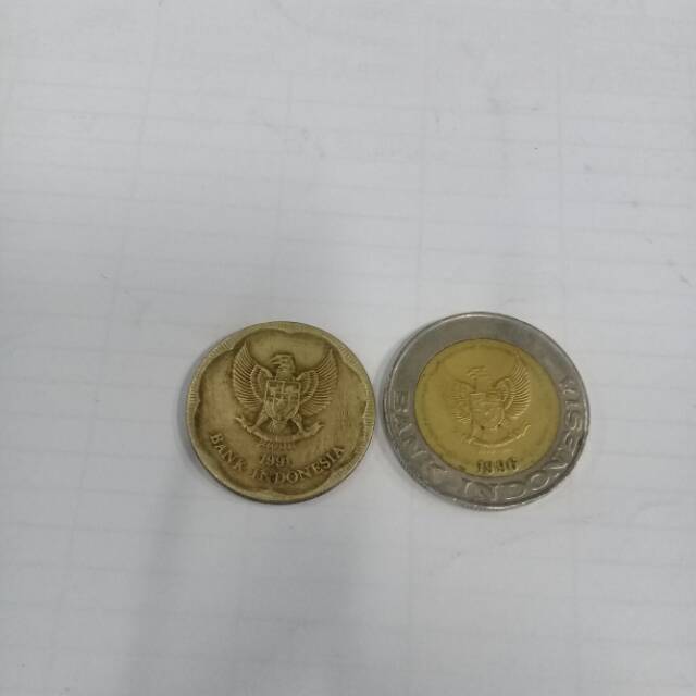 koin kuno 1000 kelapa sawit dan 500 bunga melati