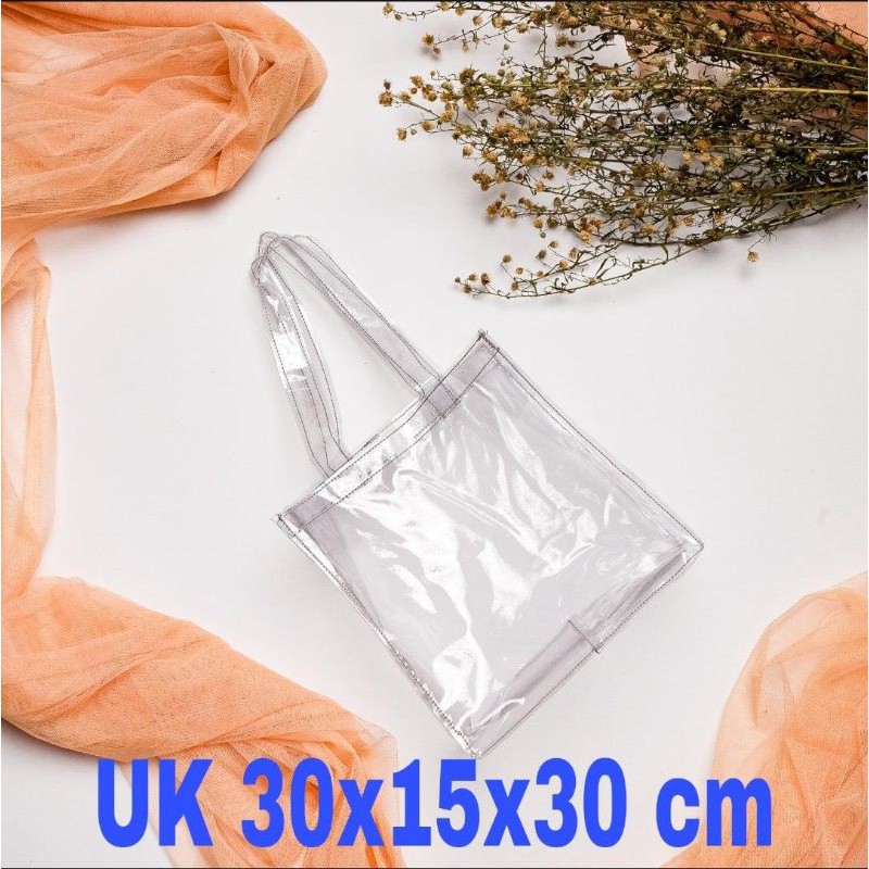 

Tas Souvenir Transparant Bening Uk 30x15x30cm