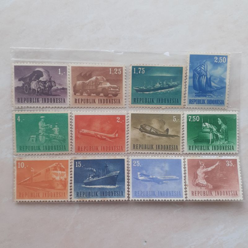 

(A) Perangko Indonesia Alat - Alat Transportasi Tahun 1964 set lengkap - 12pcs