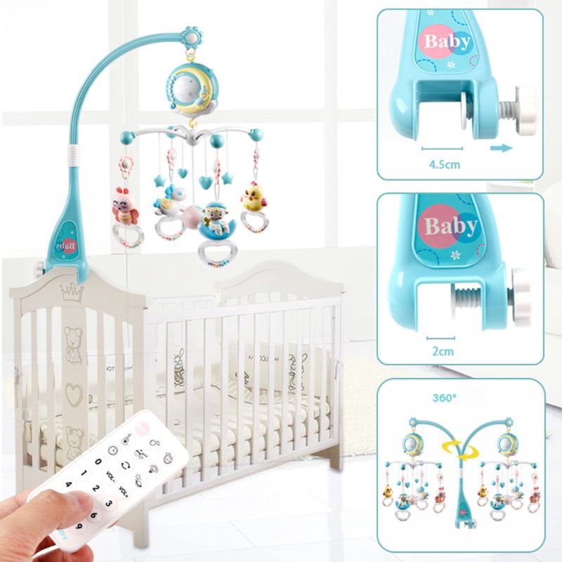 cot bed musical toys