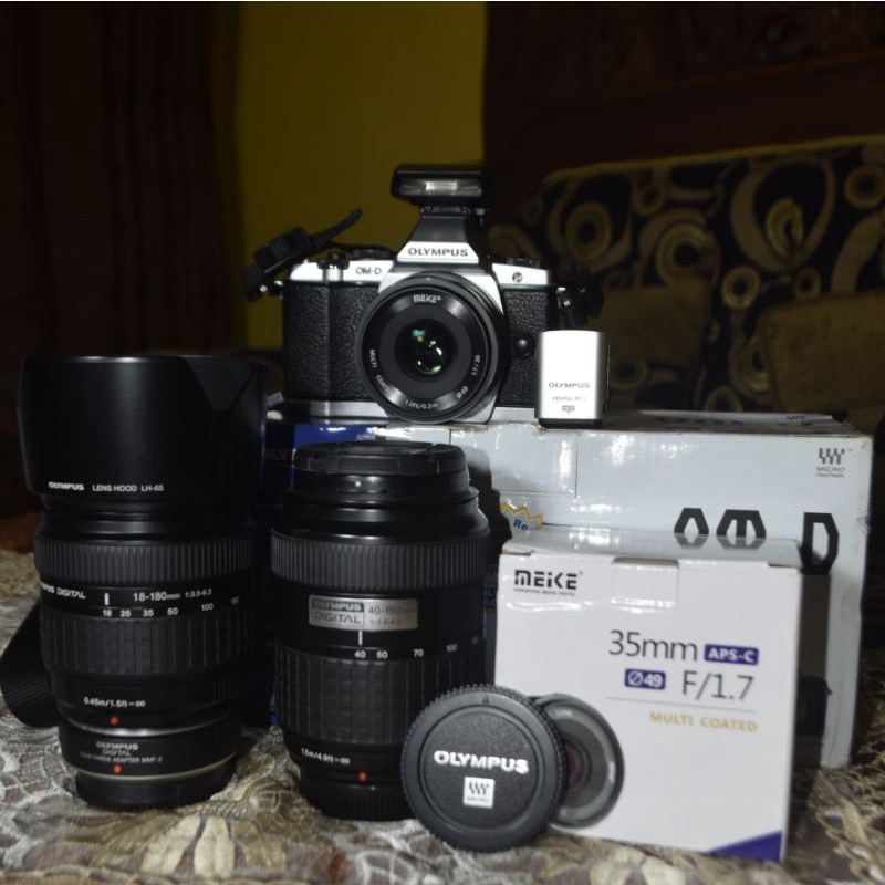 Olympus omd em5 bekas full box + lensa fix 35mm dan 18-180mm