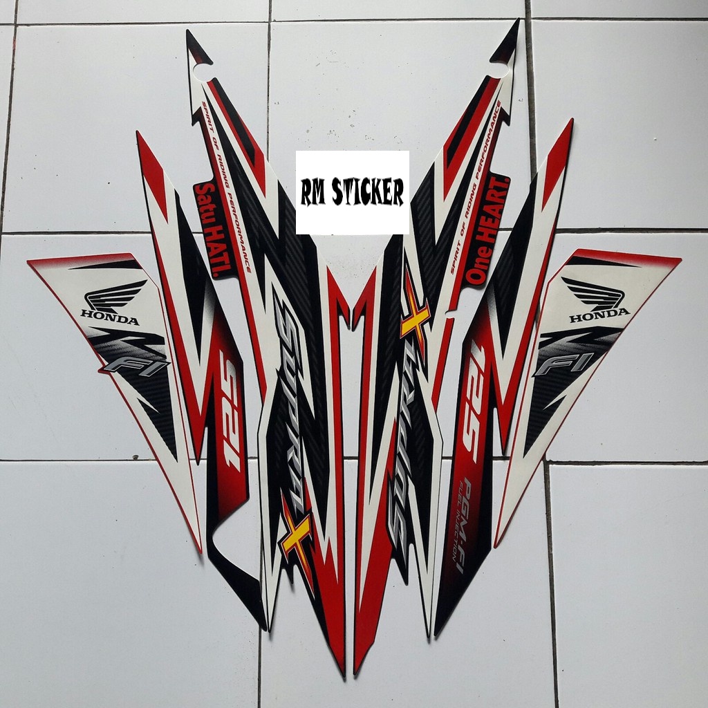 striping motor supra x 125 fi 2014 hitam-merah
