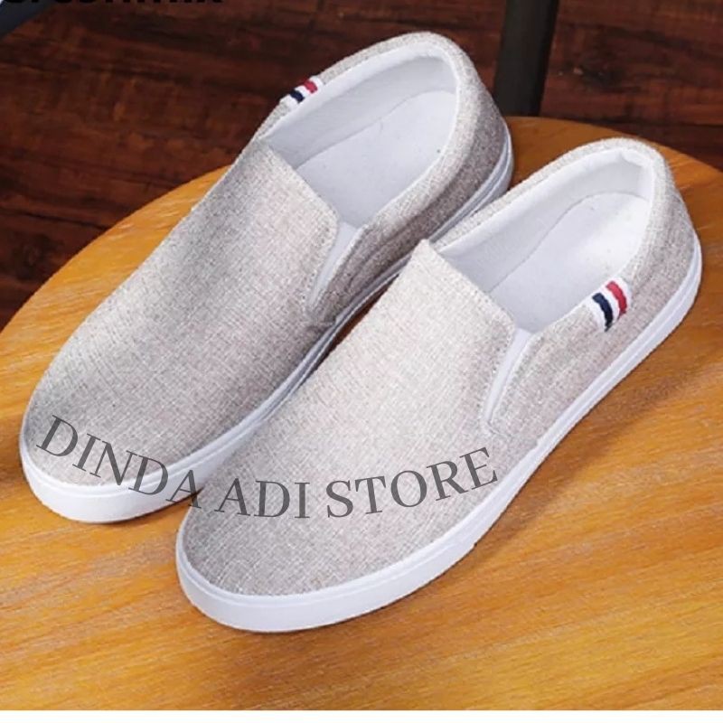 Dinda Sepatu Wanita Slip On Kanvas Korea Trendy model 2022 simple warna krem dan hitam ukuran 36-40