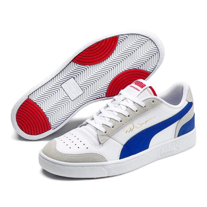 white and red puma trainers
