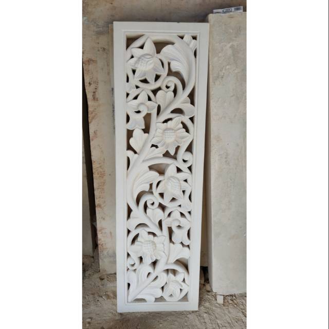 ukir batu relief ornamen loster hiasan dinding