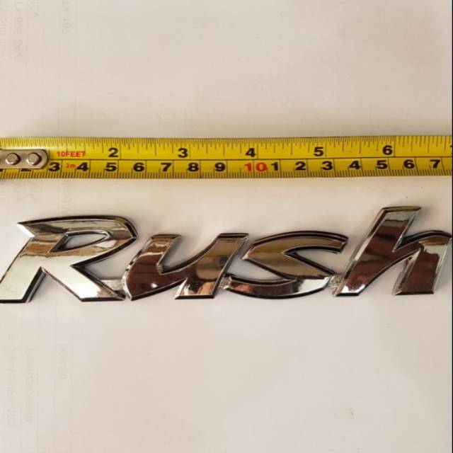 Emblem tulisan RUSH