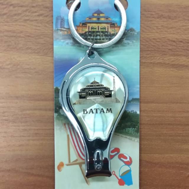 

Souvenir gunting kuku 5