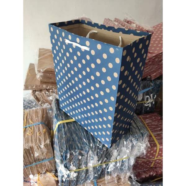 

Paper bag baju motif (26*12*33)