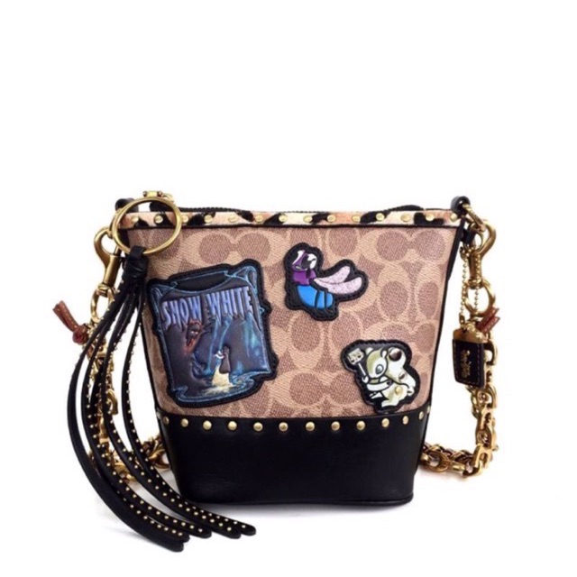 

Coach X disney duffle in signature patchwork