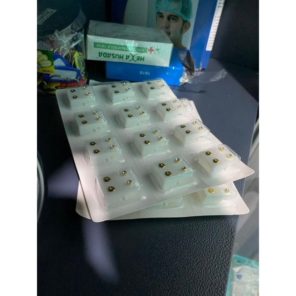 anting tindik model emas