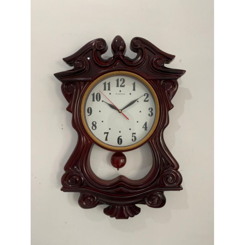 jam dinding besar model klasik motif kayu mahoni bandul