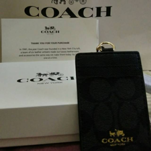 

Coach Signature ID Tag Lanyard