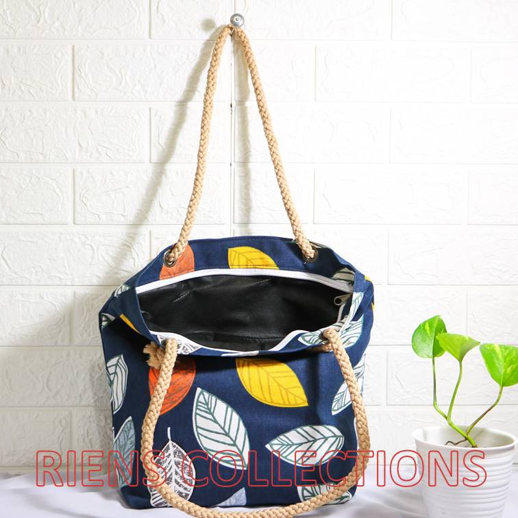 RIENS COLLECTIONS. TOTEBAG KANVAS TALI SUMBU MOTIF DAUN NANGKA BIRU