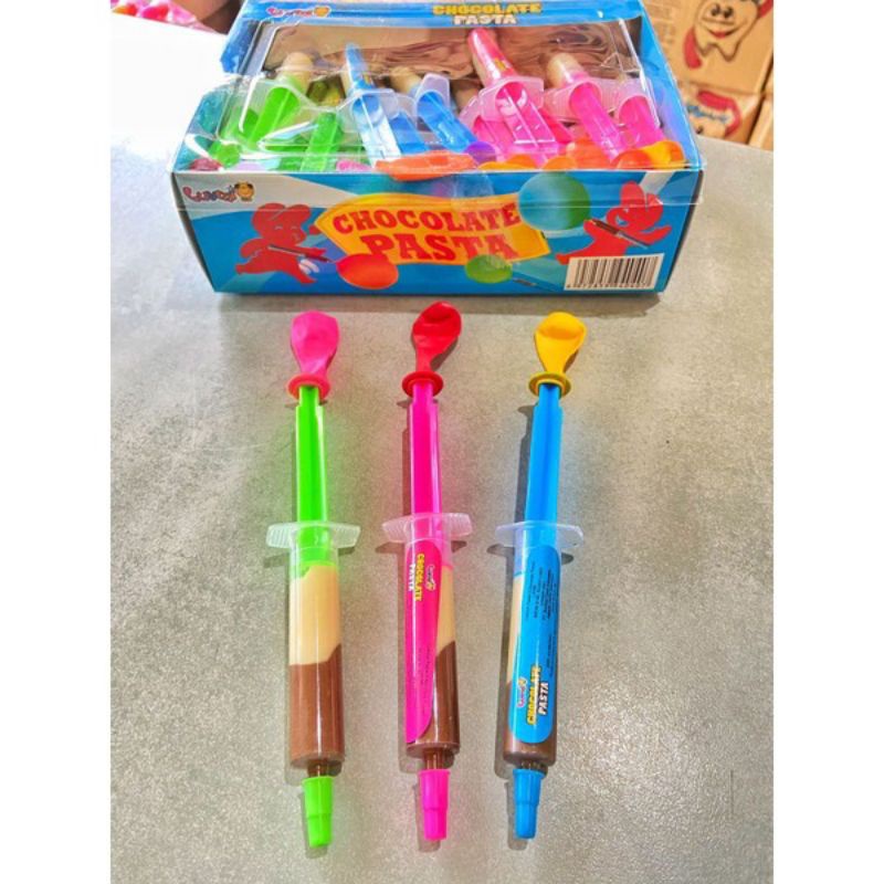 

permen coklat pasta bentuk suntikan berhadiah balon sangat digemari anak