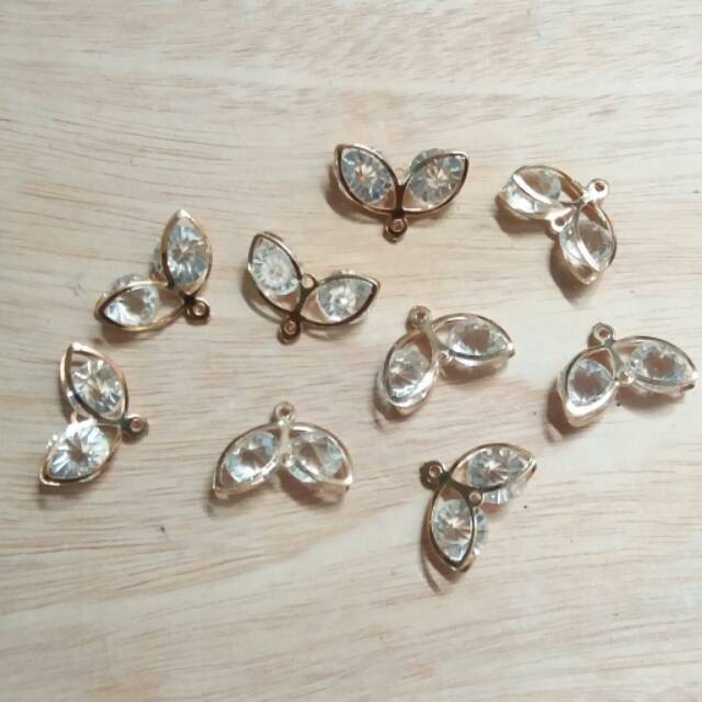 

Liontin 2 daun/10 biji