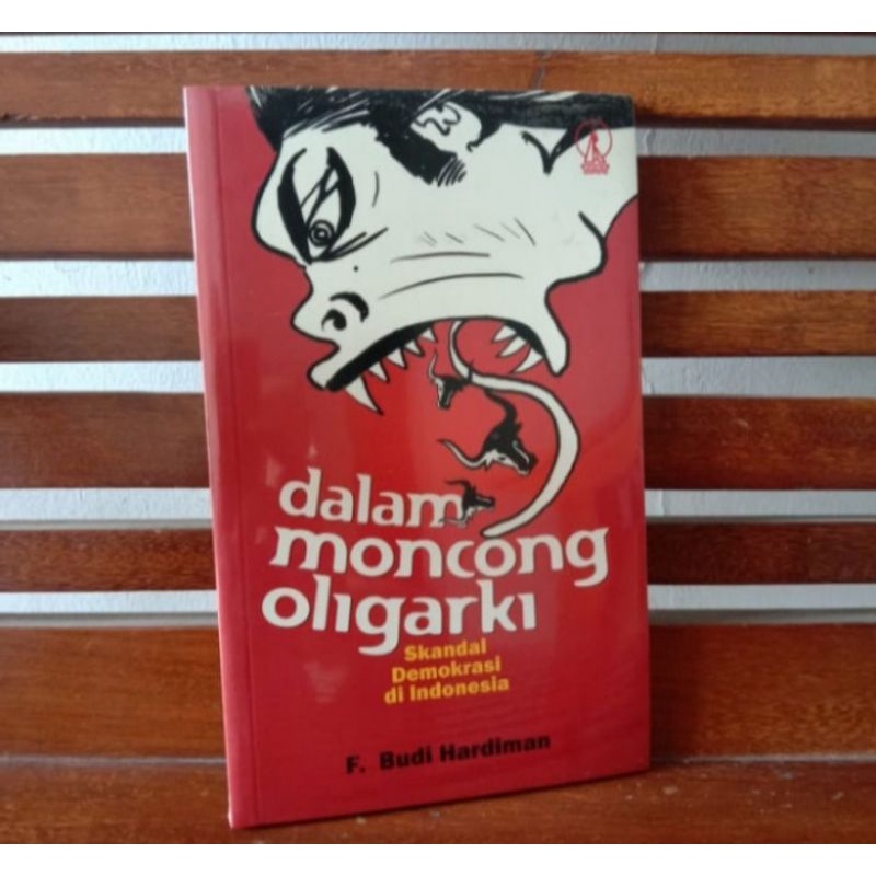 BUKI DALAM MONCONG OLIGARKI
