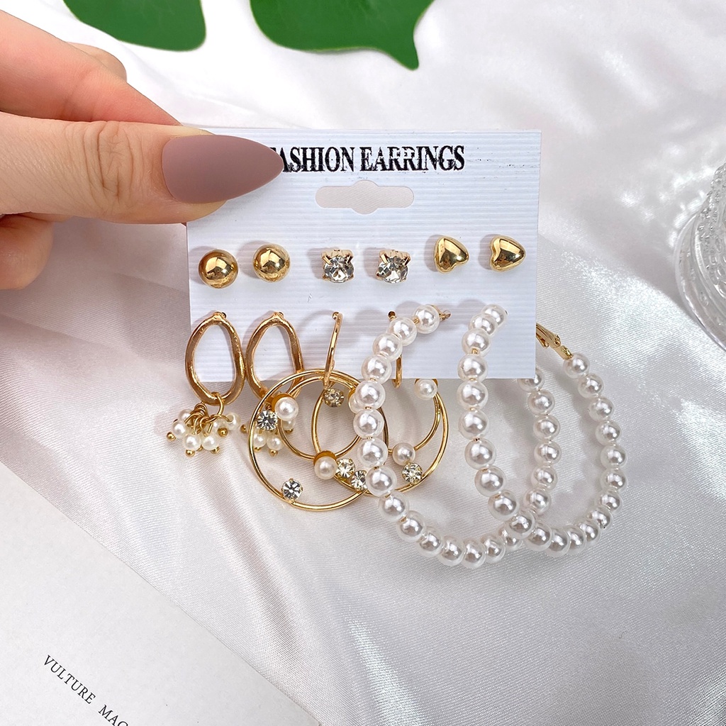 Set Anting Hoop Desain Kupu-Kupu Warna Emas Aksen Mutiara Bahan Logam Gaya Punk Untuk Wanita