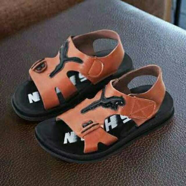 Sepatu sandal Puma brown