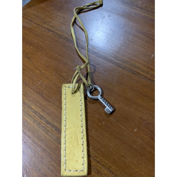 keyfob atau keycharm preloved fossil kuning