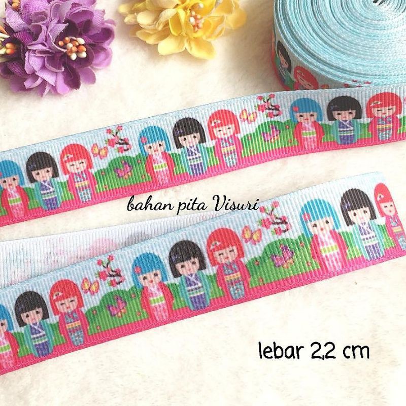 Pita Imlek Motif Boneka per yard (90 cm)