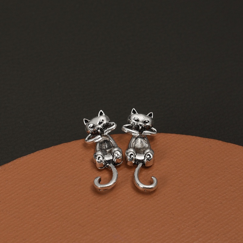Anting Stud Desain Kucing Pirecing Warna Silver Gaya Retro Gothic Untuk Wanita