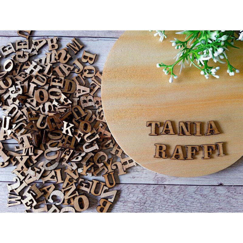 cutting huruf plywood