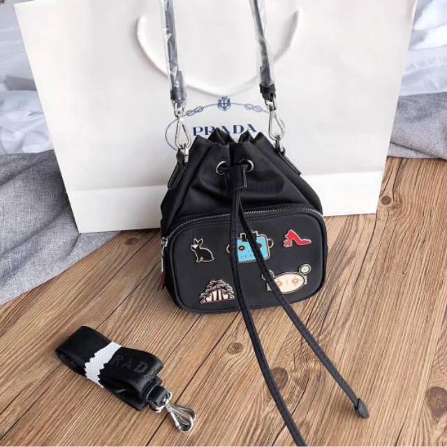 prada robot bucket bag