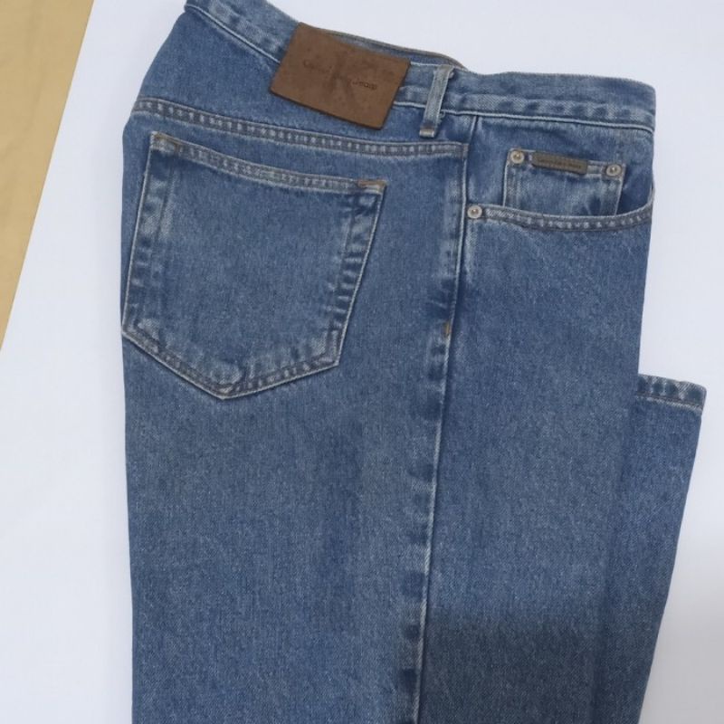 Celana jeans pria Calvin Klein low bootcut Vintage original second 32