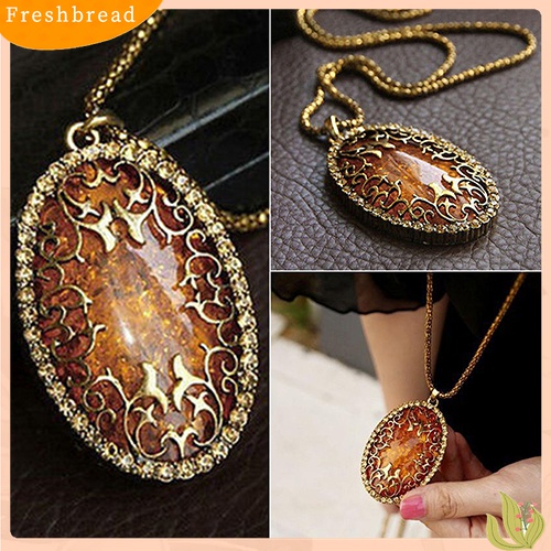 [TERLARIS]Women's Vintage Amber Tone Hollow Long Chain Drop Pendant Sweater Necklace