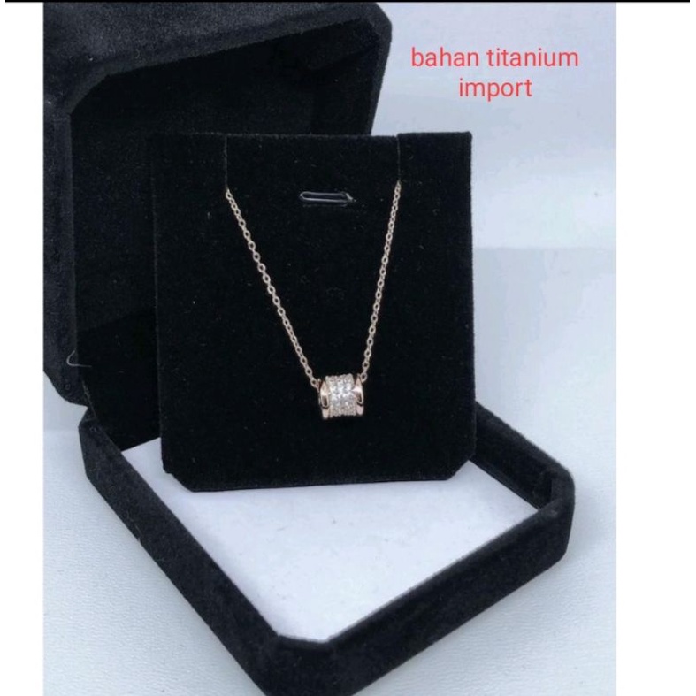 kalung titanium import