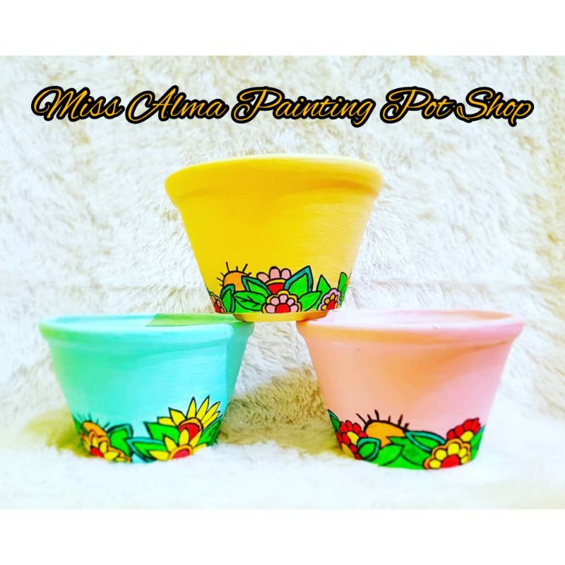 

pot gerabah lukis motif bunga