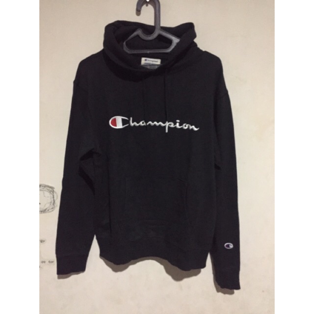 harga hoodie supreme x champion original