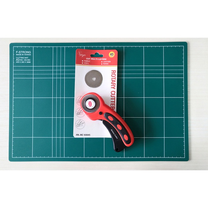 

kertas-pemotong- paket hemat cutting mat a3 (2 sisi) + rotary cutter freya + refill -pemotong-