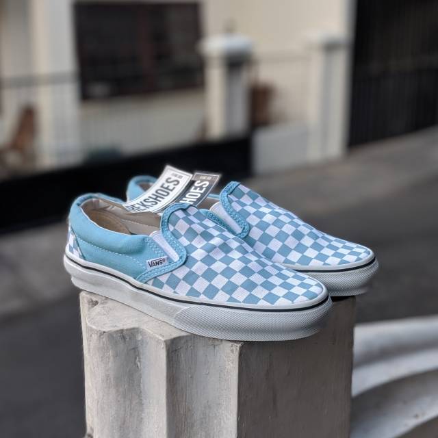 sky blue slip on vans