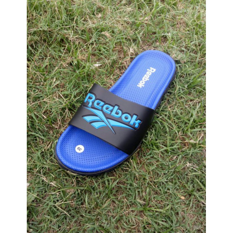 Sandal selop kickers silang garis garis biru